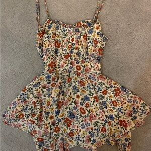 Floral open back romper size small
